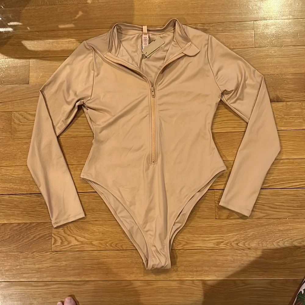 SKIMS SWIM ZIP FRONT LONG SLEEVE ONE PIECE in Ochre NEW